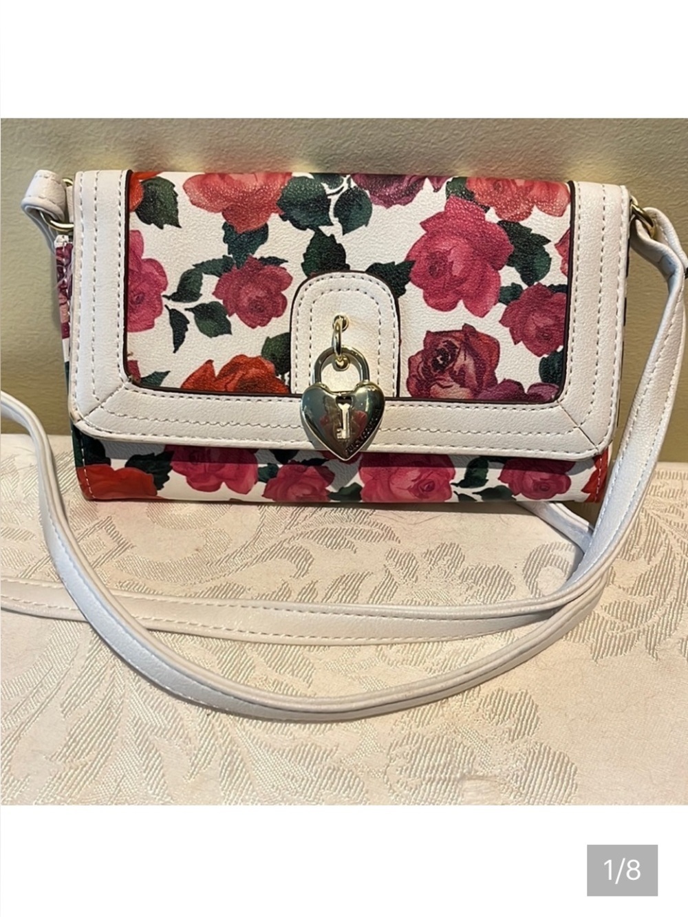 Juicy Couture  crossbody bag wallet   Floral / White Trim 8 w x 5”h x 1.5”d NWOT